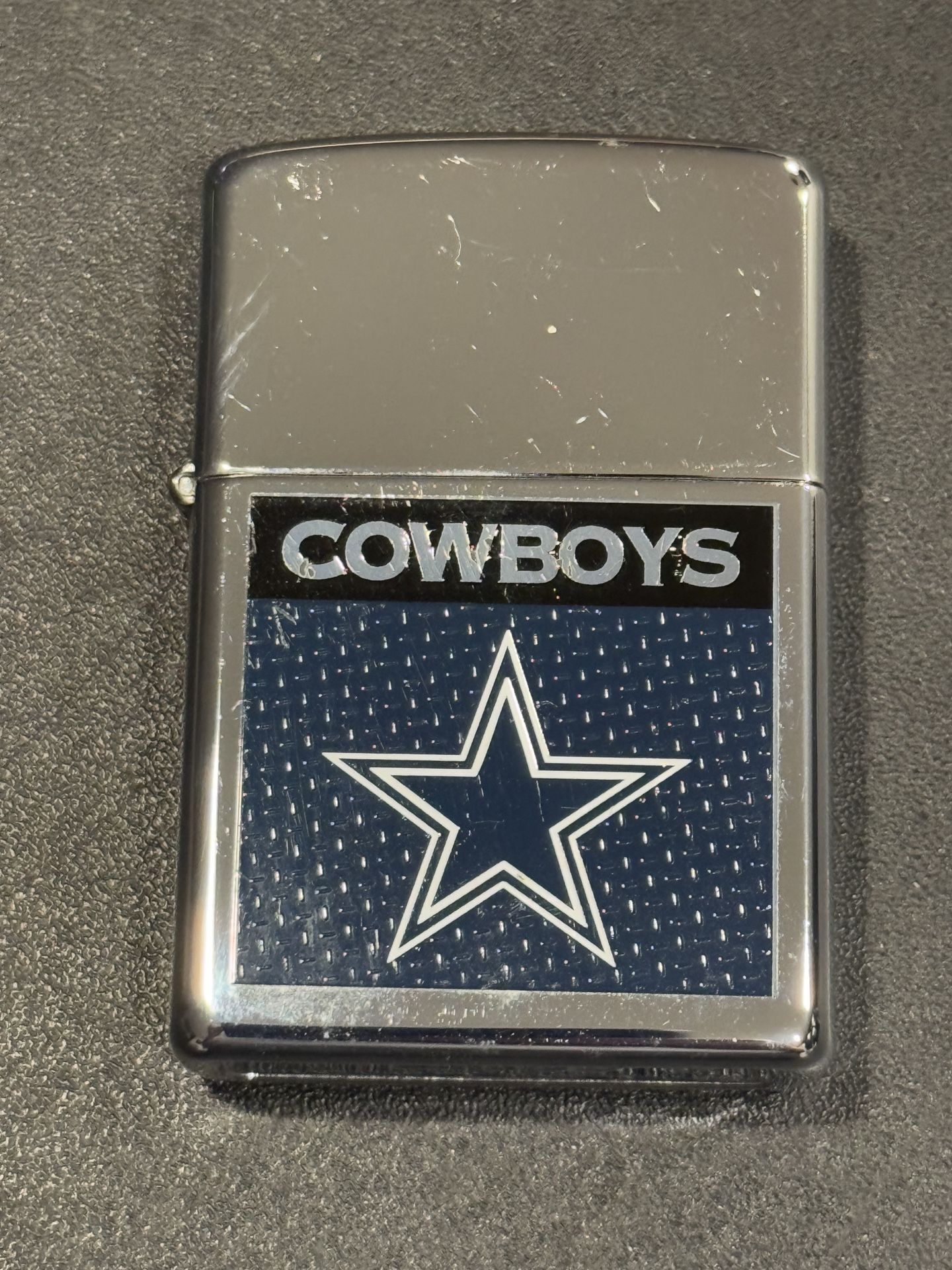 Vintage 2007 Dallas Cowboys NFL High Polish Chrome Zippo Lighter. Used condition, good flint.