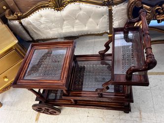 Handcrafted wooden serving trolley