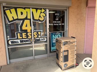 Portable air-conditioning unit 13,500 BTU cools 450 ft.² comes with window kit
