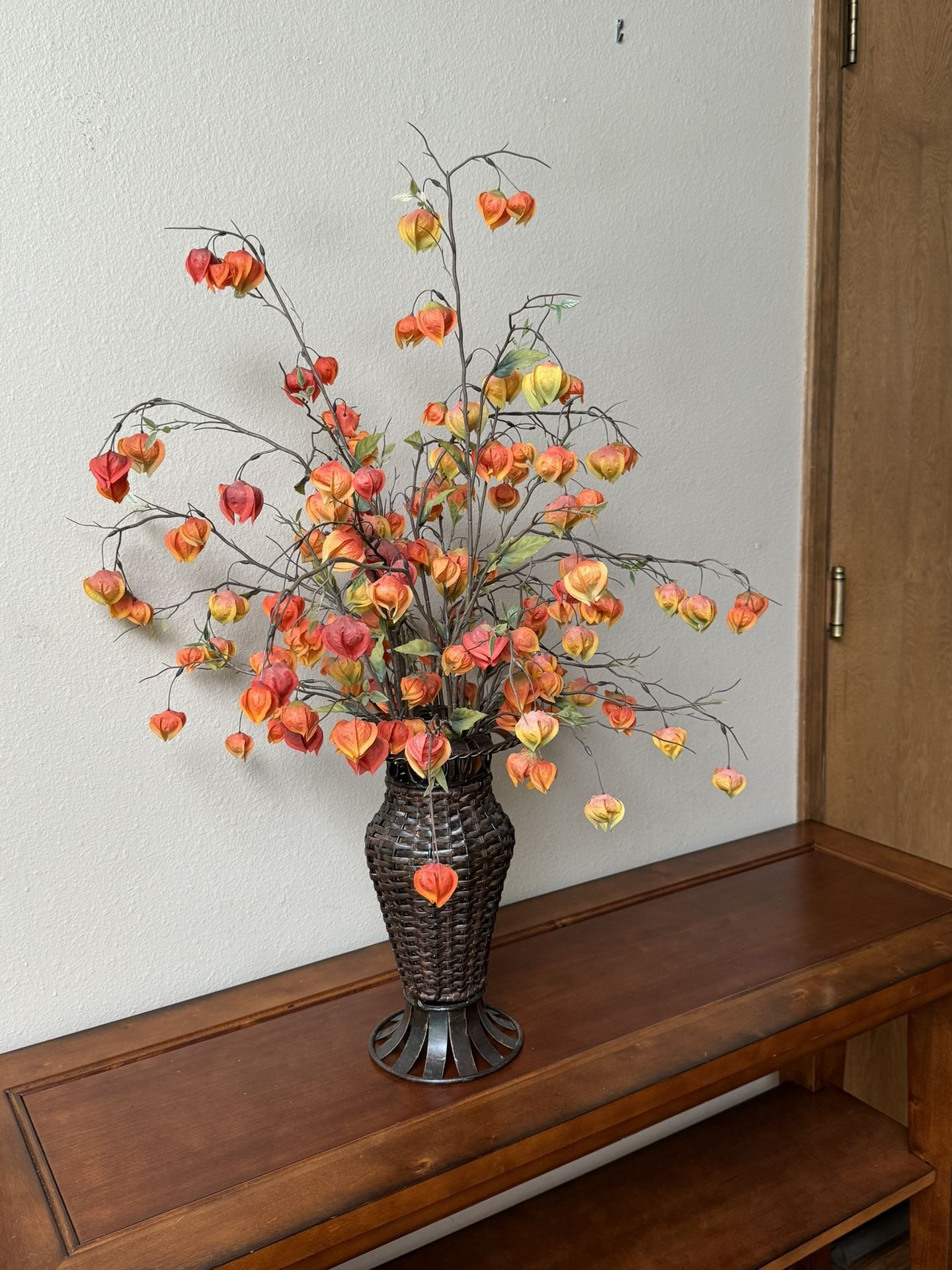 Fall Flower Arrangement In Wrought Iron & Wicker Vase