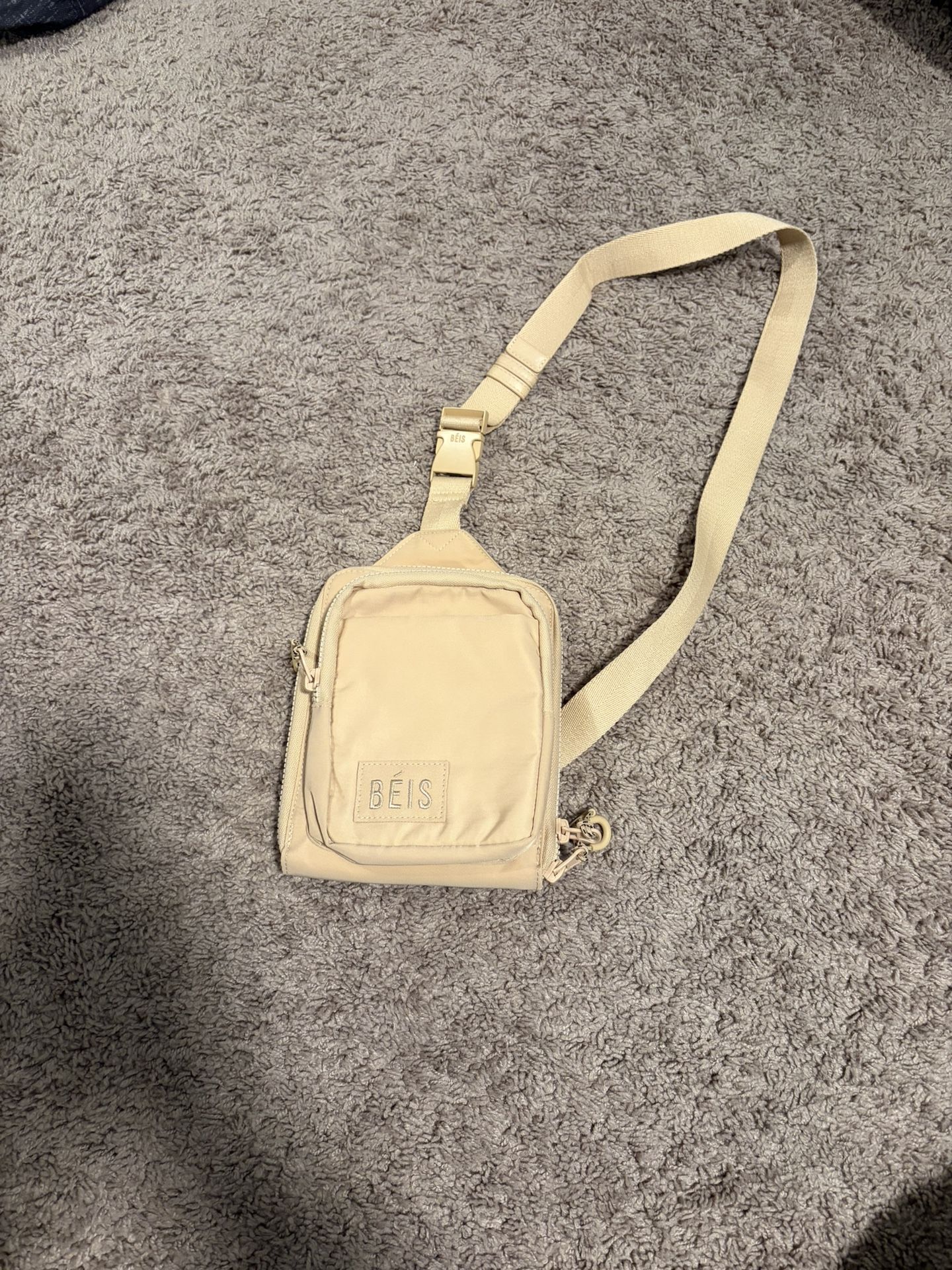 The Sport Sling in Beige Crossbody Bag Women’s
