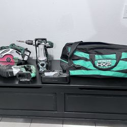 Hitachi Battery Powered Tool Set With 2 Batteries, Charger And Bag, Drill, Circular Saw, Light And Sawzall, In Good Working Condition 