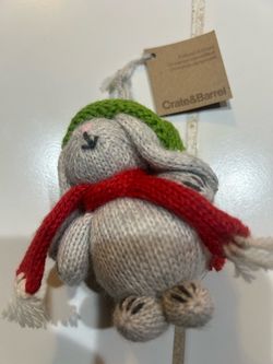the Alpaca Grey Bunny with Hat and Scarf Christmas Tree Ornament sold by Crate & Barrel (produced in partnership with the Melange Collection
