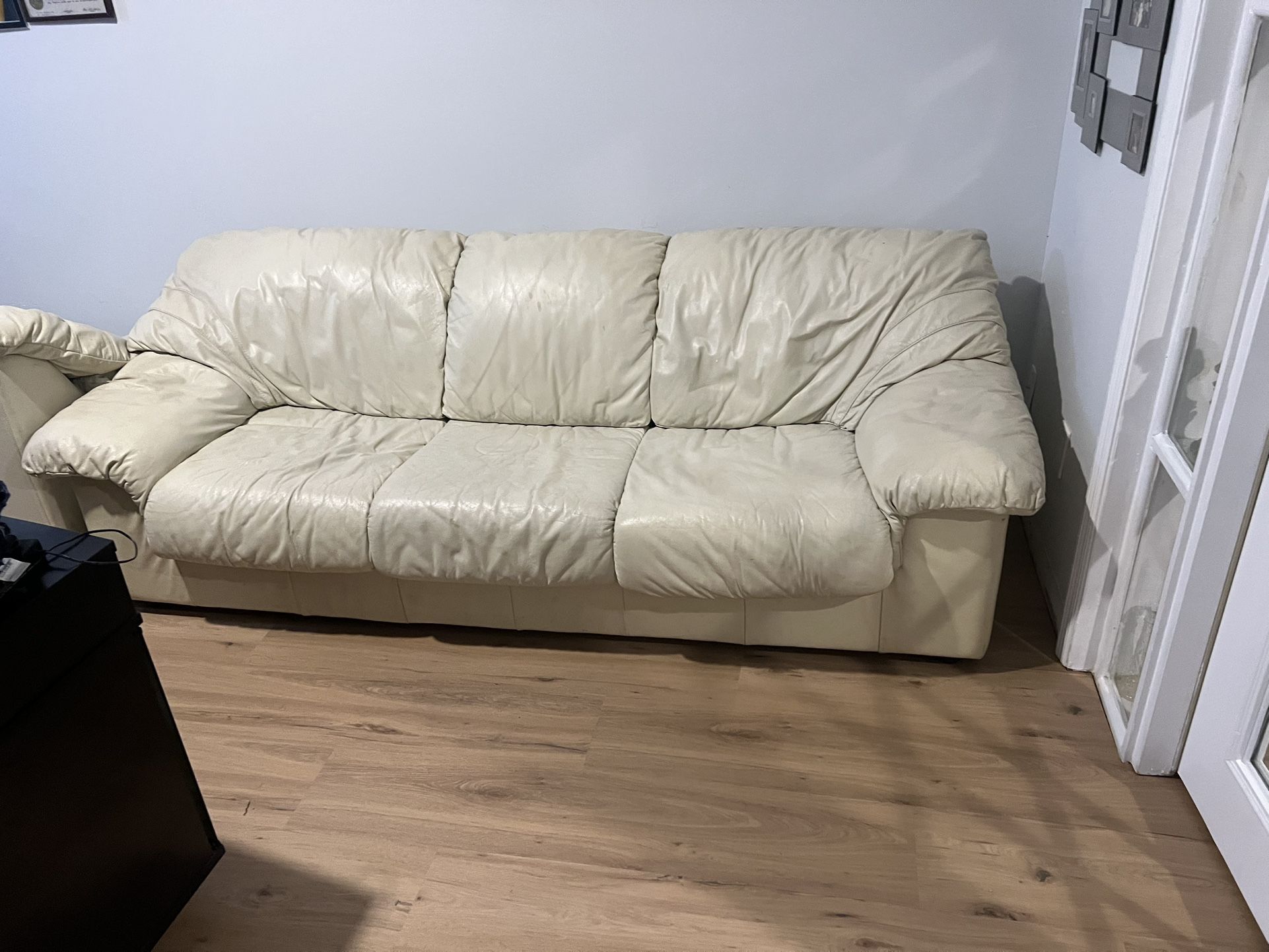 2 White Leather Sofas For $100