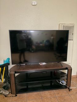 Samsung TV with tv stand