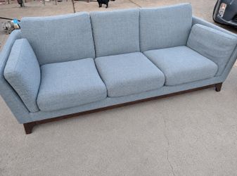 Light blue article couch *can deliver