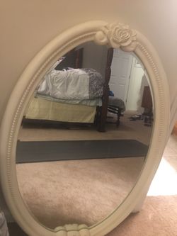 White oval mirror