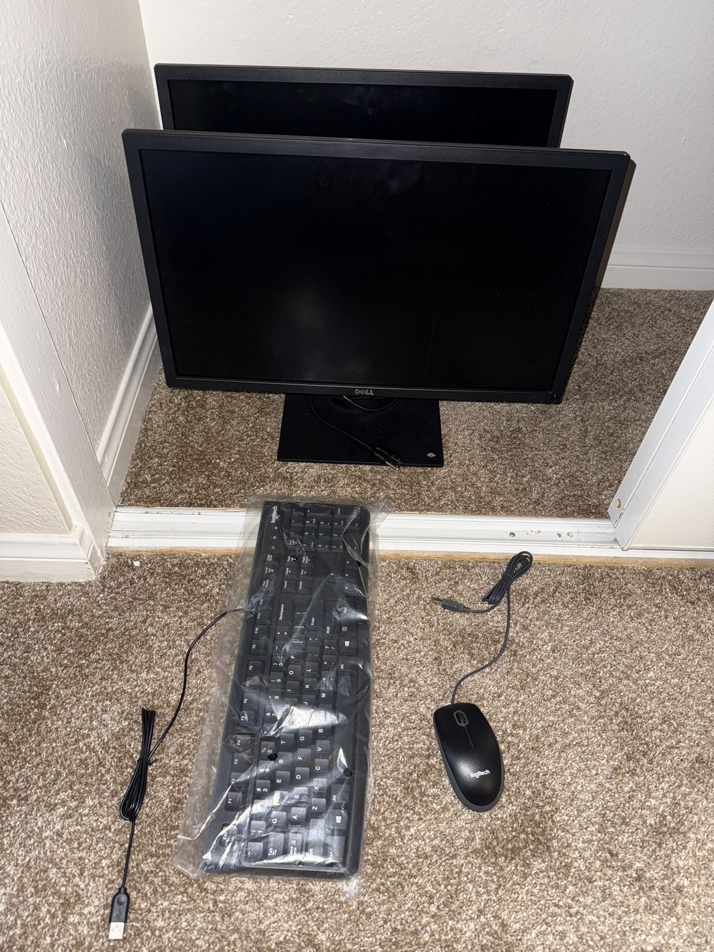 Two Dell Monitors With Logitech Keyboard And Mouse