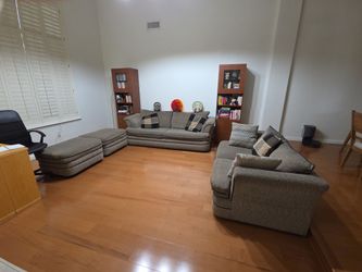 Sleeper sofa, loveseat and ottomans