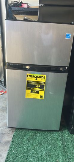 Mini refrigerator with top freezer