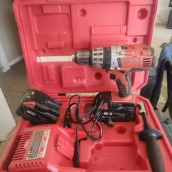 It's a 28 V hammer of drill, Milwaukee, double battery charger in good condition. Plenty of power.