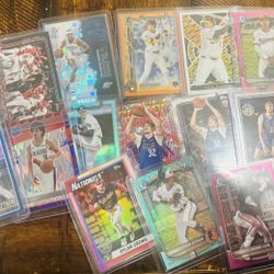 Baseball/Basketball card lot. Valued around $240 all NM. Auto, numbered