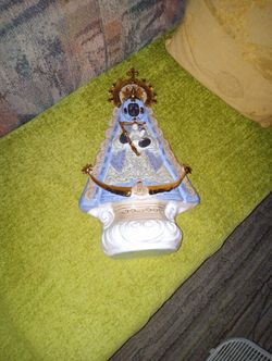 A Black Lady Holding The Baby