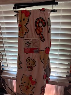 hello kitty & strawberry shortcake throws