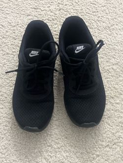 Nike black Tanjun trainers, size US 8 Women