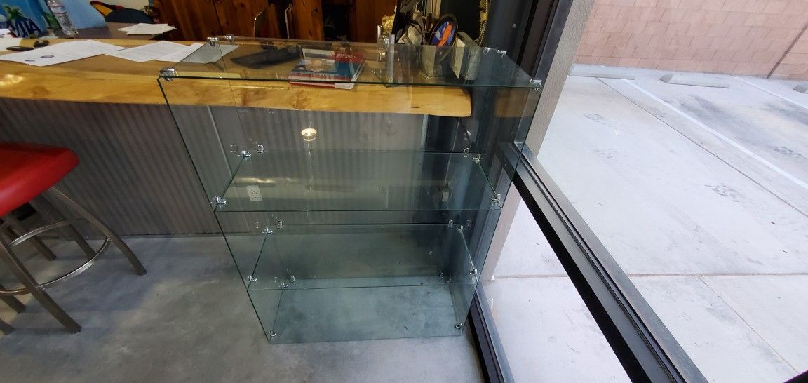 Glass display shelving unit