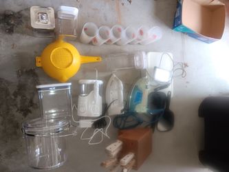 Selling 2 irons, tooth pick sprayer, 6 glasses, set of old kitchen knives, 2 Tupperware. Spaghetti strainer, 2 hand mirrors