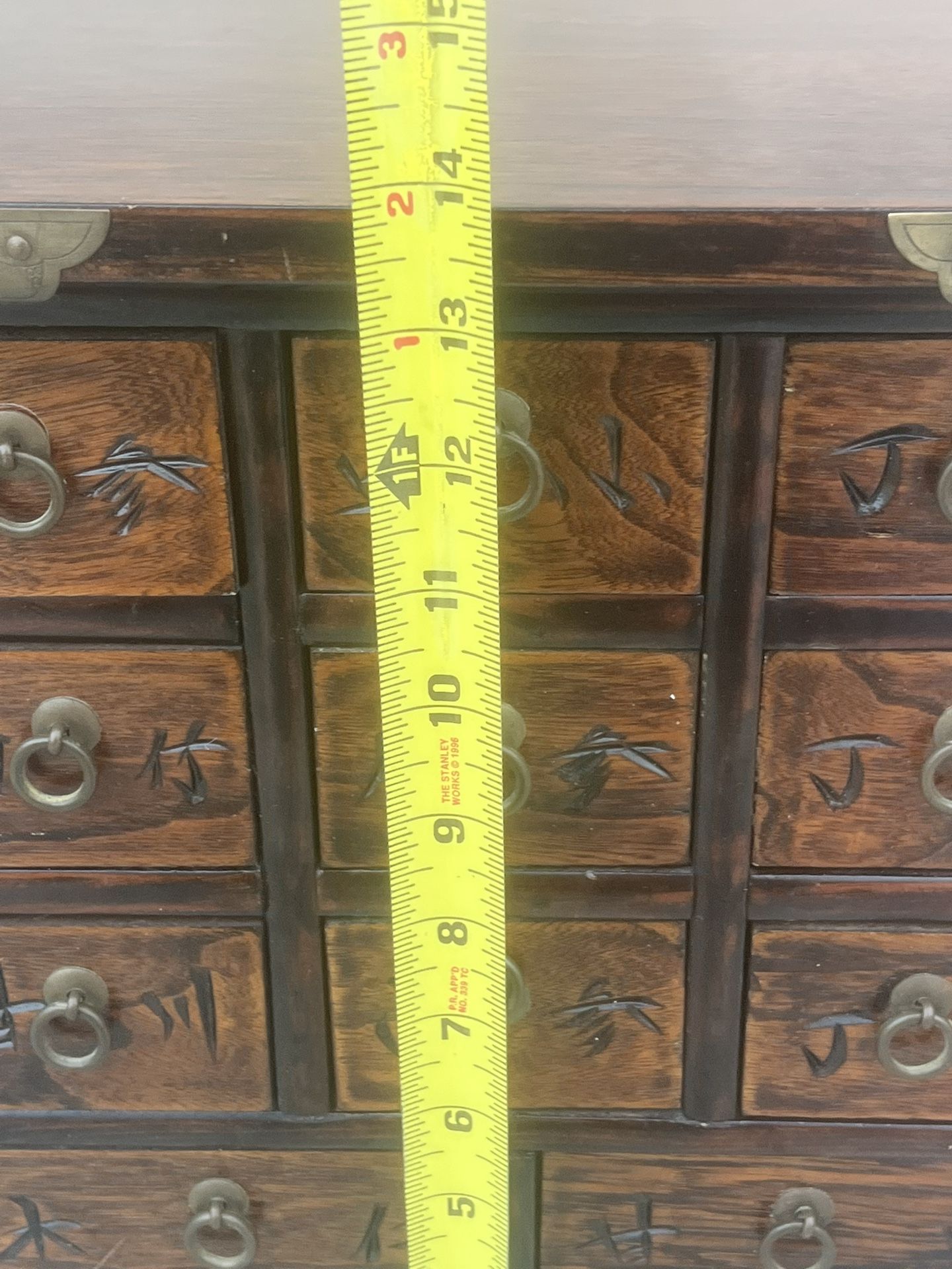 Asian Korea Wooden Brass Eleven Drawer Apothecary Chest/ Jewelry Trinket Box. Used in good condition with minor cosmetic blemishes. These blemishes ar