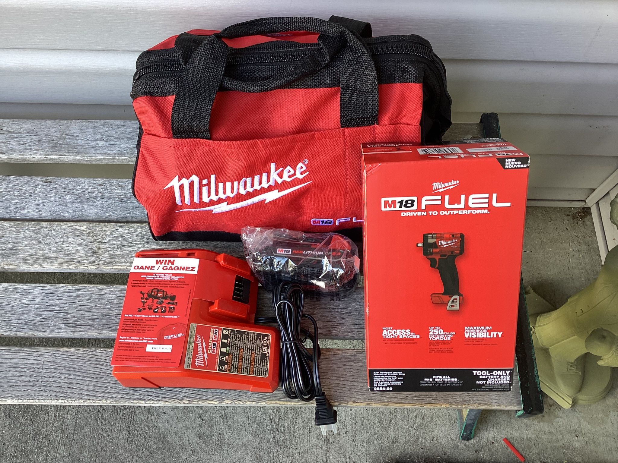 Milwaukee M18 FUEL Impact Wrench 3/8” With Battery , Charger And Tool Bag. Brand NEW.