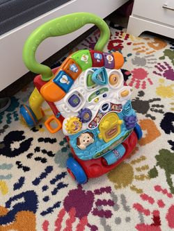 V TECH STROLLER AND DISCOVER ACTIVTY WALKER