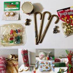 Lot of Christmas craft, decorating, and wrapping supplies.  