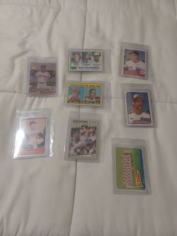 8 sports cards 5 rookies and 3 non rookie cards