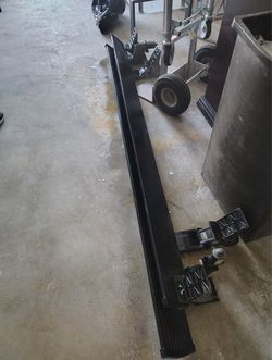 AMP Research PowerStep Running Boards 75113-01A, which are automatic, electric-powered retractable truck steps.