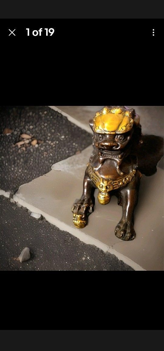Chinese Guardian Lion, often referred to as a "Foo Dog" or "Fu Dog"