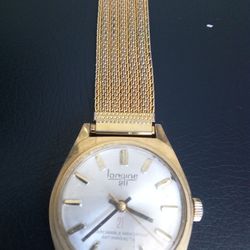 Watch gold tone nonmagnetic watch ⌚