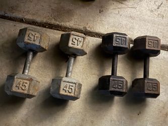 Pair of 45 lb dumbbells $1 a lb.