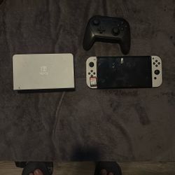 Nintendo Switch OLED with Pro Controller and Smash Bros Ultimate