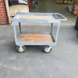 metal cart in good condition 24 wide 36 long 34 high