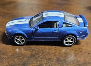 Kinsmart 2006 Metallic Blue Ford Mustang GT diecast pull back action