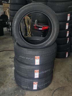 (4) USED TIRES BRIDGESTONE 265/50 R20