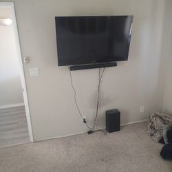 46in. Sony TV with Sound Bar/ Sub  and Wall Mount
