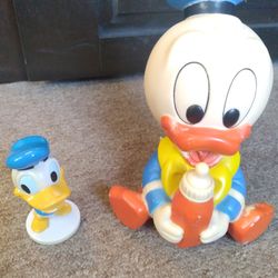 2 Vintage Donald Duck toys. A squeak toy, and a bobblehead toy