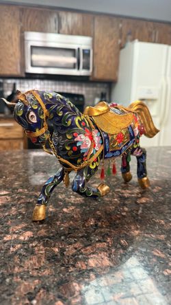 A metal cloisonne' figure of horse