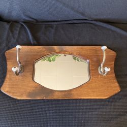Mirror with hangers