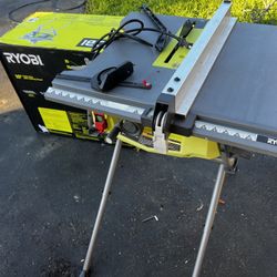 RYOBI TABLE SAW  15 Amp 10 in. Compact Portable Corded Jobsite Table Saw with Folding Stand