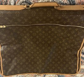 Louis Vuitton  1995 Still Mint Garment bag Brown Original Fold Over 23.5 X 4.5 X 19” (42”)Strap  Authentic and Mint  Used 1 Time !! Lightly !!  $1390