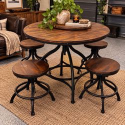 Ashley’s Industrial Round Dining Table with 4 Stools