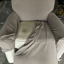 Leather Reclining Chair With Cover On It 
