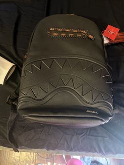 Blacked out spray ground bag