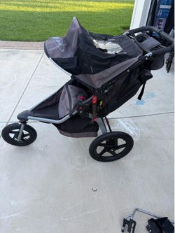 BOB jogging stroller with Nuna car seat attachment and Britax pram attachment