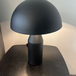 Pair Of Oluce Atollo Table Lamp, designed by Vico Magistretti, featuring a matte black metal finish