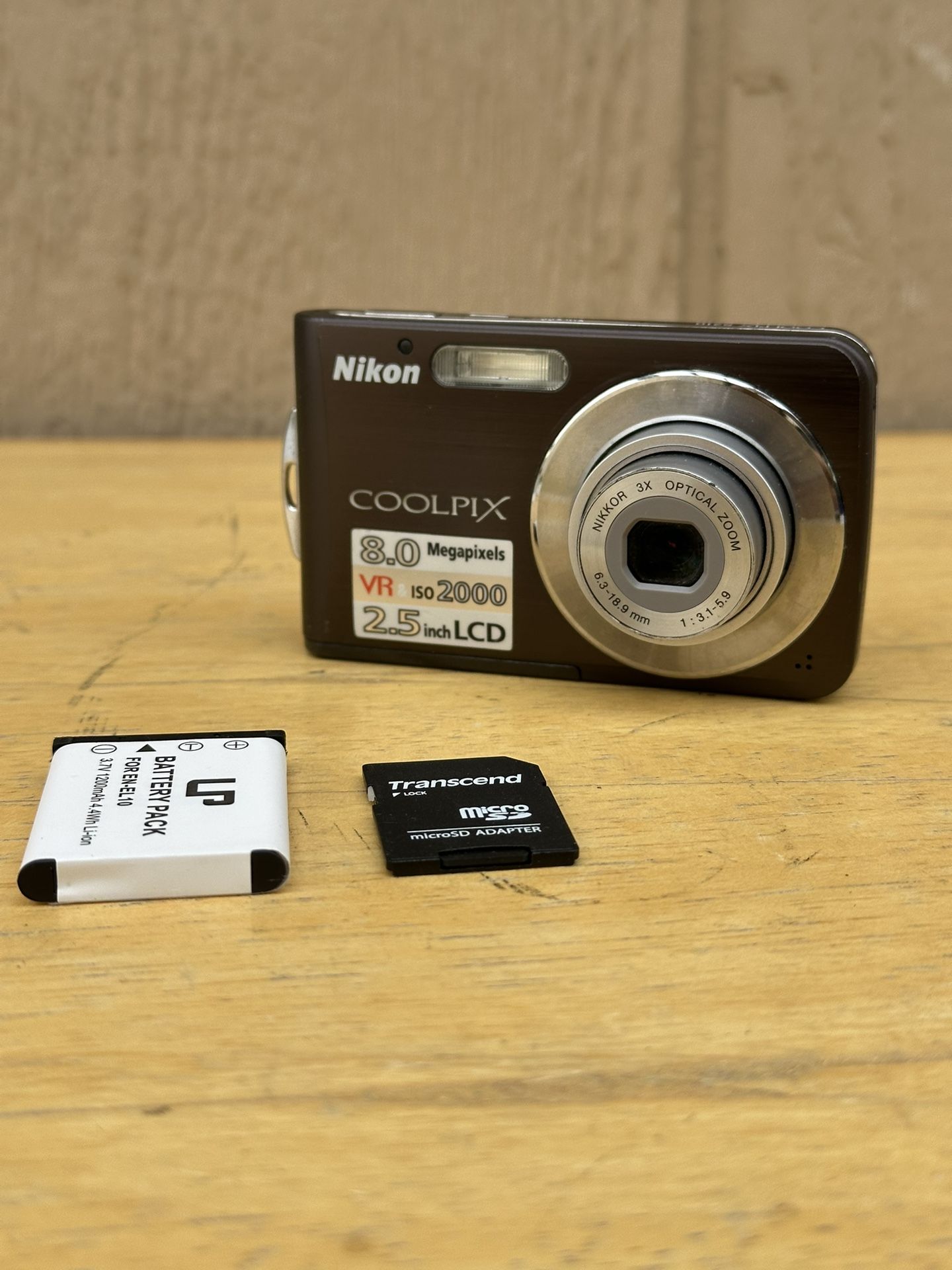 Nikon Coolpix S210 8.0MP Digital Camera Plum W/New Battery , SD Card Lens Error