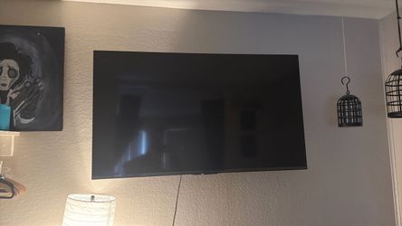 Large Flat Screen TV with wall mounted