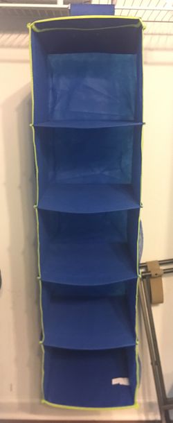 5 shelf storage with 2 side pockets