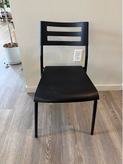Four Black Outdoor/Indoor Chairs
