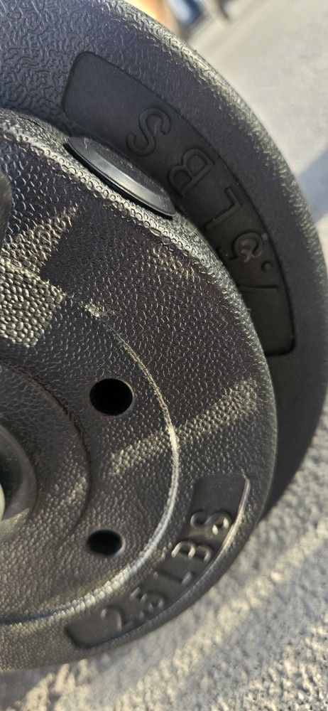 ADJUSTABLE DUMBELL SET
